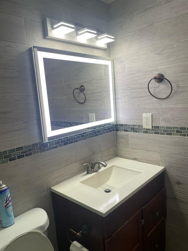 114-27 135th St, South Ozone Park, NY 11420 - half bath with vanity, toilet, and tasteful backsplash