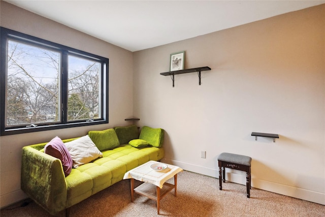 living room with carpet flooring and baseboards