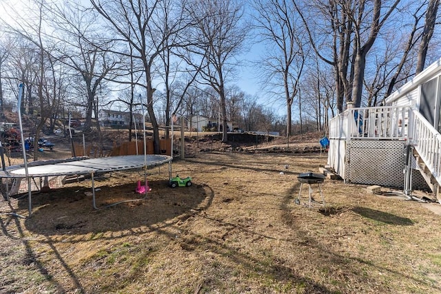 view of yard featuring a trampoline