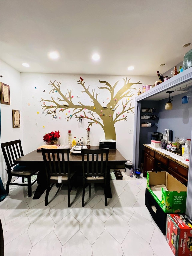 dining space with recessed lighting