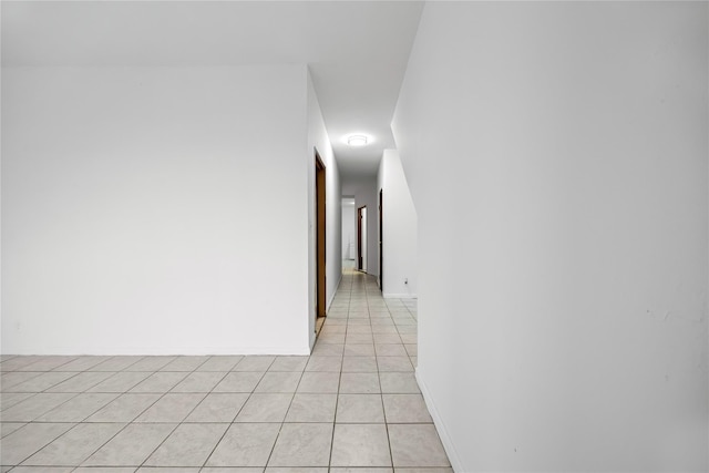 112-21 15th Ave, College Point, NY 11356 - hall featuring light tile patterned floors and baseboards