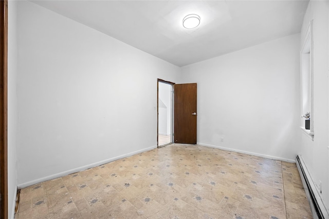 112-21 15th Ave, College Point, NY 11356 - unfurnished room featuring a baseboard heating unit and baseboards