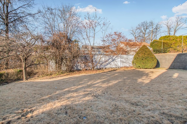 view of yard featuring fence