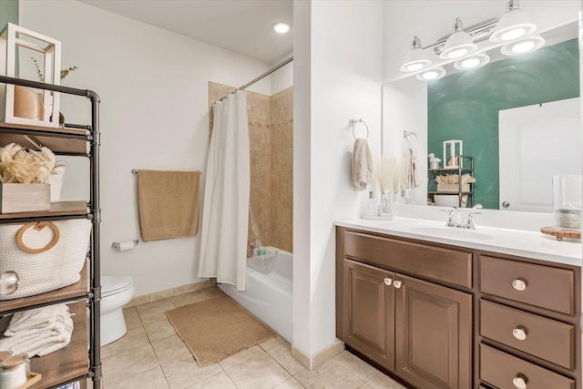 full bathroom with tile patterned floors, shower / tub combo, toilet, and vanity