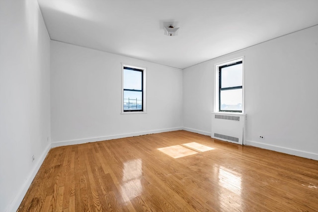 3636 Greystone Ave Unit 6M, Bronx, NY 10463 - unfurnished room featuring light wood-style floors, baseboards, and radiator