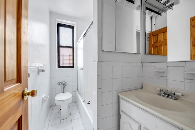 3636 Greystone Ave Unit 6M, Bronx, NY 10463 - full bathroom featuring tile patterned flooring, tile walls, shower / washtub combination, toilet, and vanity