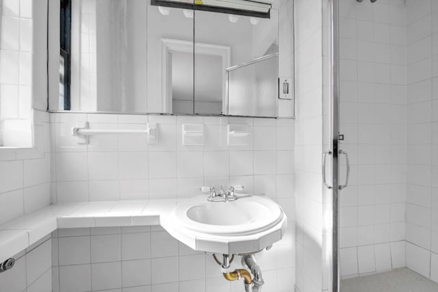 3636 Greystone Ave Unit 6M, Bronx, NY 10463 - full bathroom with tasteful backsplash, a stall shower, and tile walls