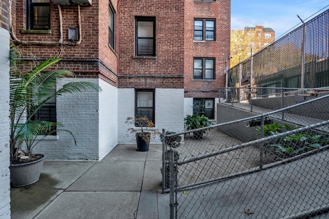 3636 Greystone Ave Unit 6M, Bronx, NY 10463 - exterior space featuring fence and brick siding