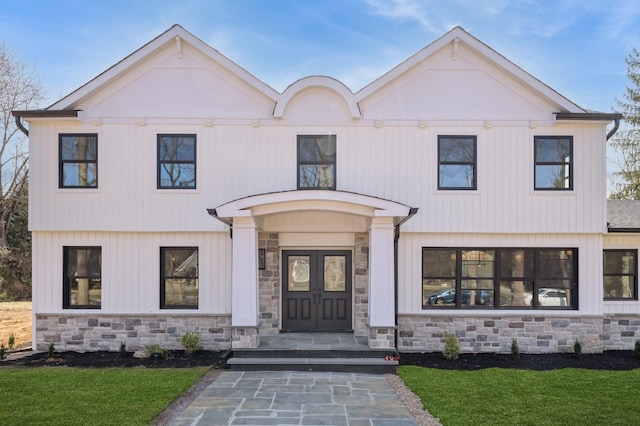 view of front of property featuring stone siding