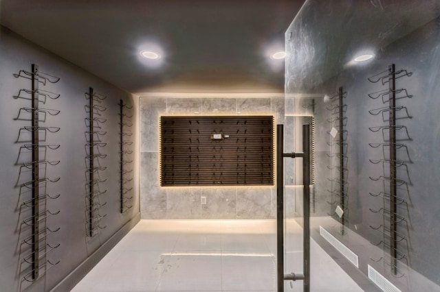 wine room featuring tile patterned flooring