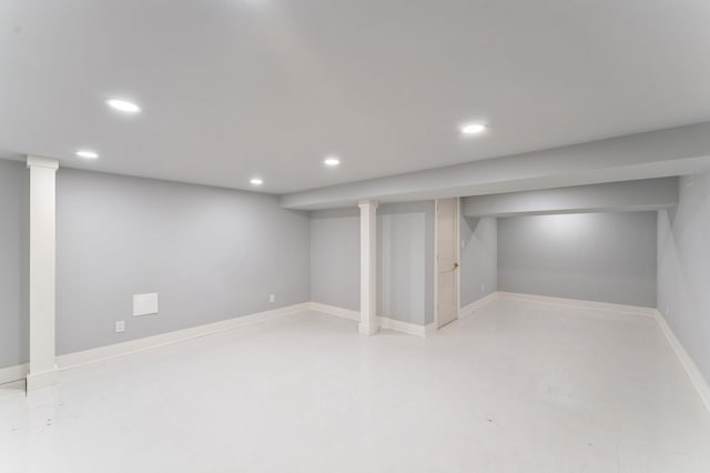 finished below grade area with recessed lighting and baseboards