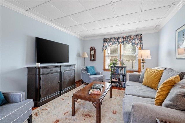 living room with ornamental molding, a paneled ceiling, wood finished floors, and a baseboard radiator