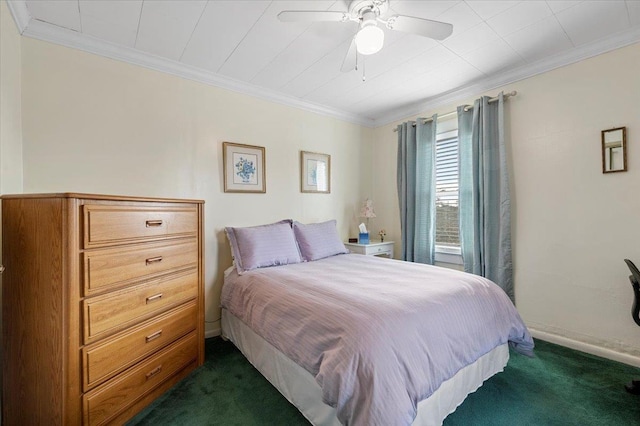 bedroom featuring dark carpet, baseboards, and ornamental molding