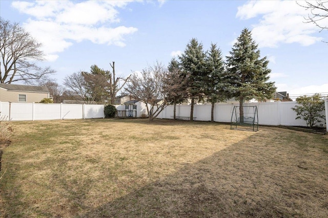 view of yard featuring a fenced backyard