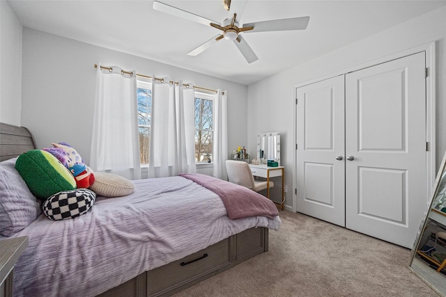 bedroom featuring a closet, carpet floors, and ceiling fan