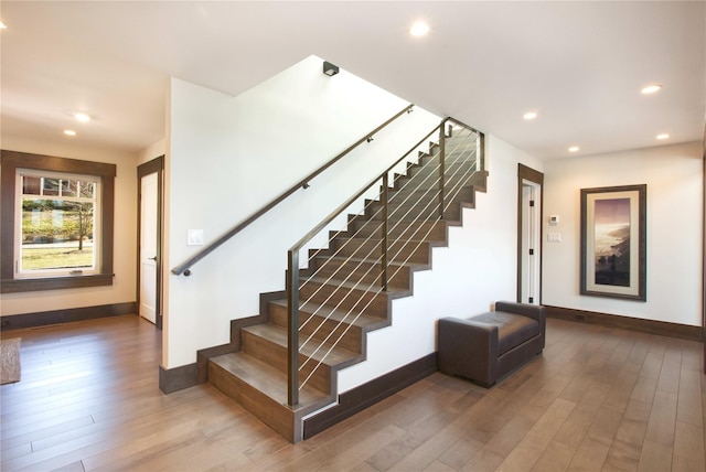 30 Half Moon Ln, Irvington, NY 10533 - stairs featuring wood finished floors, recessed lighting, and baseboards