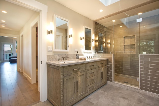 30 Half Moon Ln, Irvington, NY 10533 - bathroom featuring a sink, a stall shower, recessed lighting, and double vanity