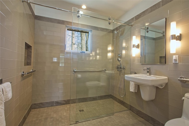 30 Half Moon Ln, Irvington, NY 10533 - bathroom with toilet, tile patterned floors, tile walls, and tiled shower