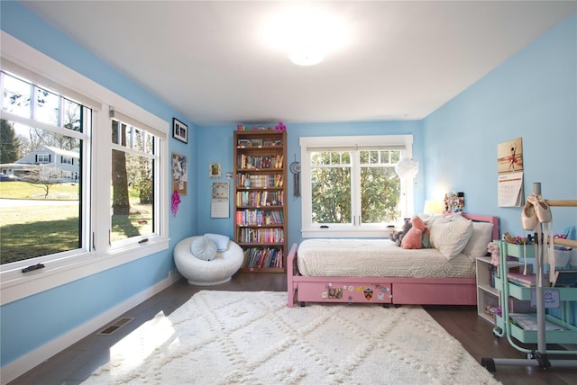 30 Half Moon Ln, Irvington, NY 10533 - bedroom with baseboards, wood finished floors, and visible vents