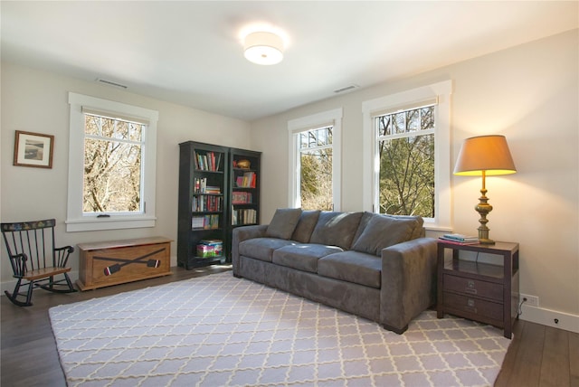 30 Half Moon Ln, Irvington, NY 10533 - living area with baseboards, light wood finished floors, and visible vents