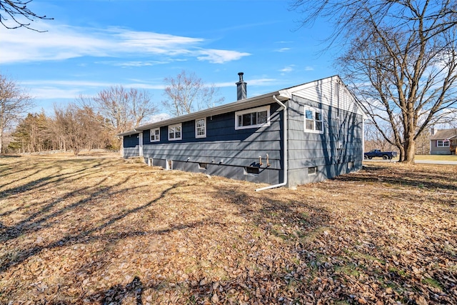 view of home's exterior with crawl space