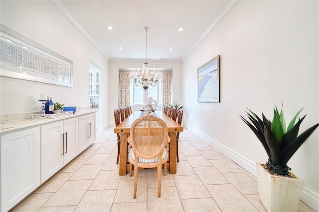 dining space featuring light tile patterned floors, baseboards, a notable chandelier, and ornamental molding