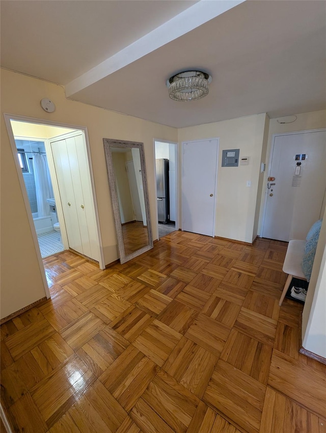 21-20 33rd Rd Unit 10B, Astoria, NY 11106 - spare room with a smoke detector and baseboards