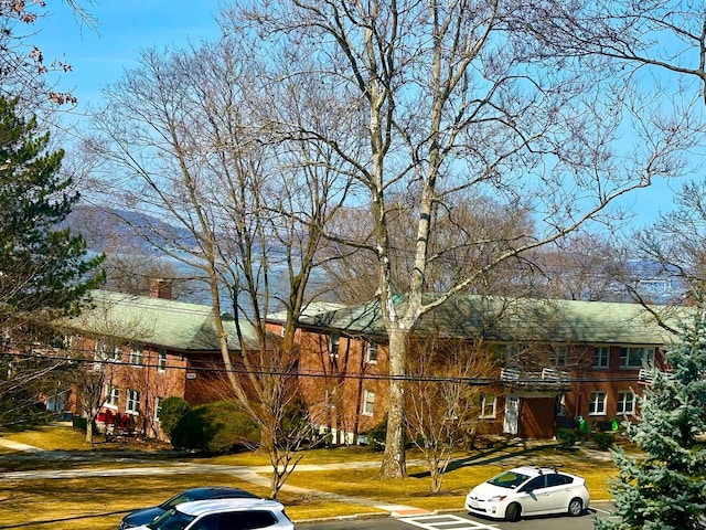 exterior space featuring a front lawn