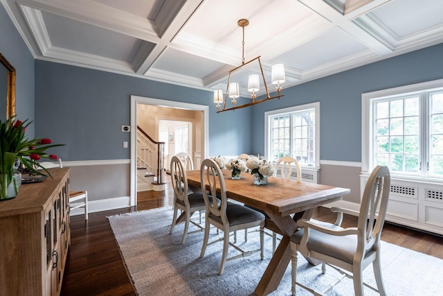 dining space featuring plenty of natural light, baseboards, dark wood-style flooring, and a chandelier