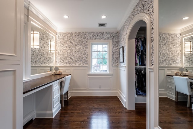 bathroom featuring visible vents, wainscoting, and wallpapered walls