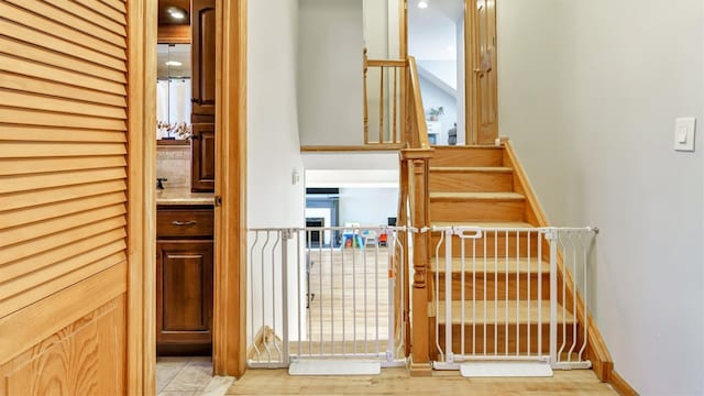 stairs featuring baseboards