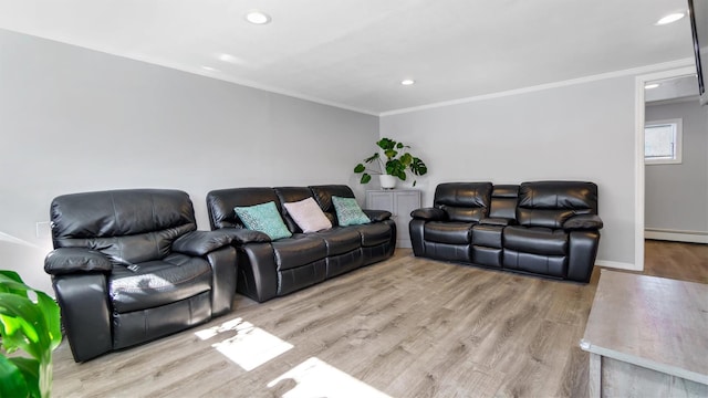 living area featuring recessed lighting, wood finished floors, and crown molding