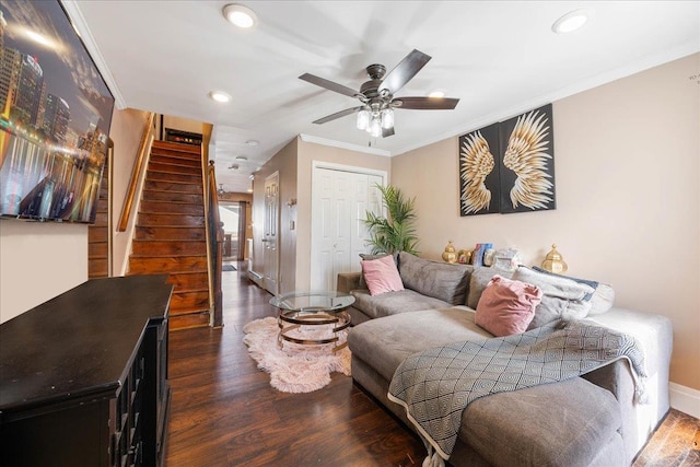 living room featuring wood finished floors, recessed lighting, stairway, crown molding, and ceiling fan