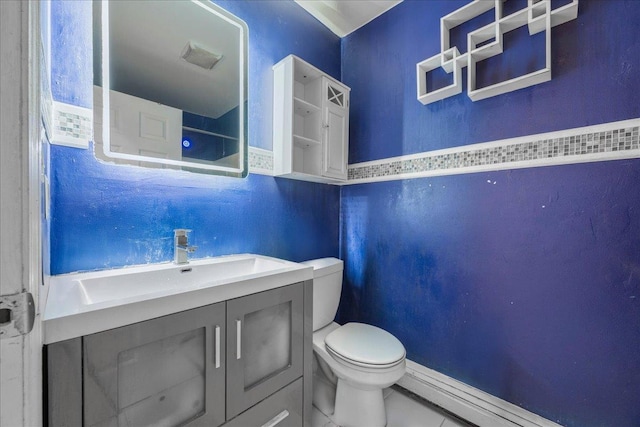 bathroom with toilet, walk in shower, and vanity