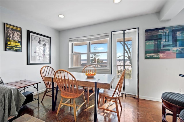 dining area with recessed lighting and baseboards