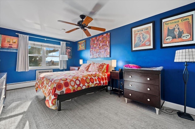 bedroom featuring a baseboard radiator, baseboards, carpet, and ceiling fan