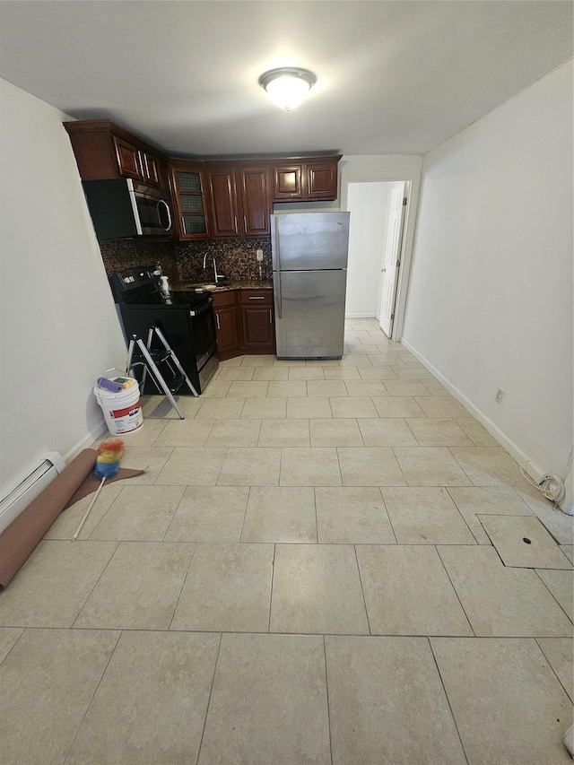 kitchen featuring backsplash, glass insert cabinets, baseboards, appliances with stainless steel finishes, and light tile patterned flooring