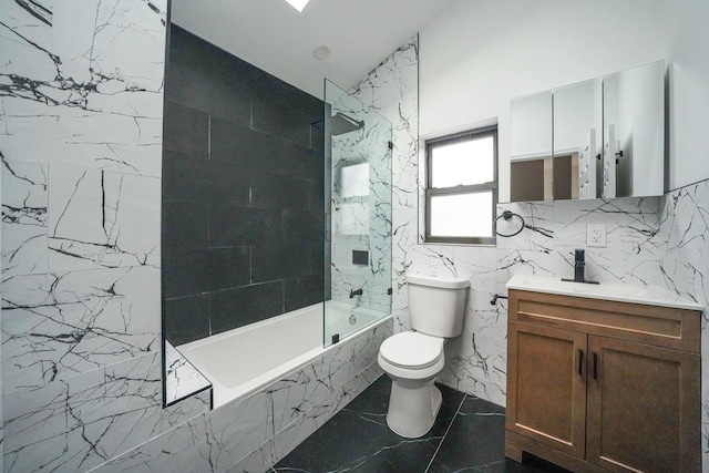 139-19 230th St, Laurelton, NY 11413 - bathroom with a combined bath / shower with marble appearance, vanity, vaulted ceiling, toilet, and marble finish floor