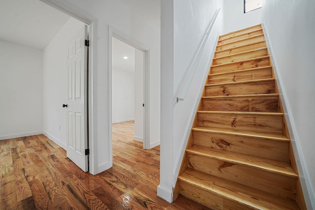 139-19 230th St, Laurelton, NY 11413 - staircase featuring baseboards and wood finished floors