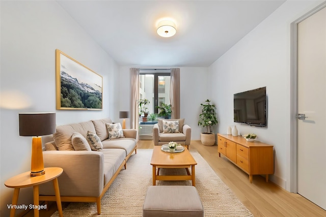 living area with light wood-style flooring