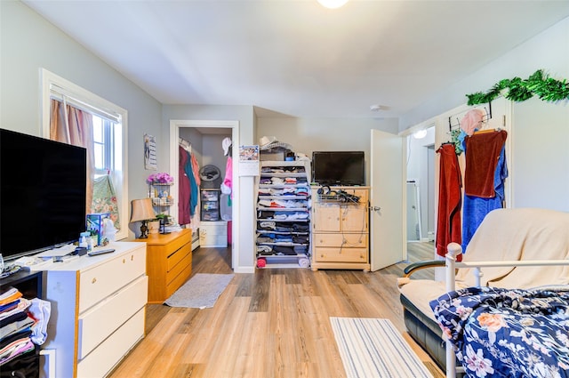 bedroom with light wood-style floors