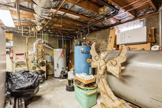 utility room with a heating unit and water heater