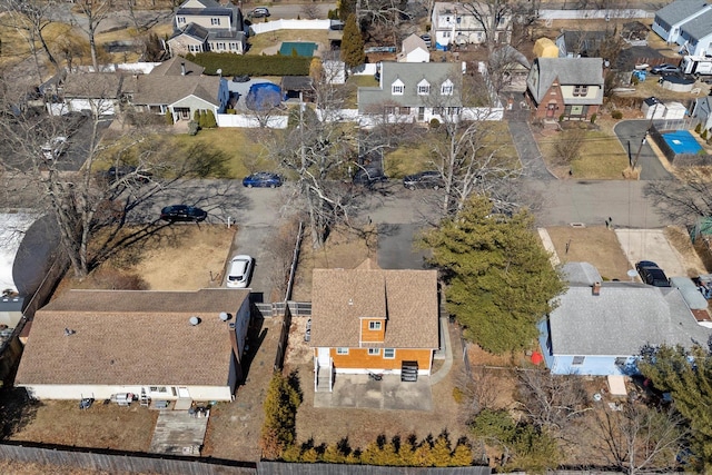 birds eye view of property with a residential view