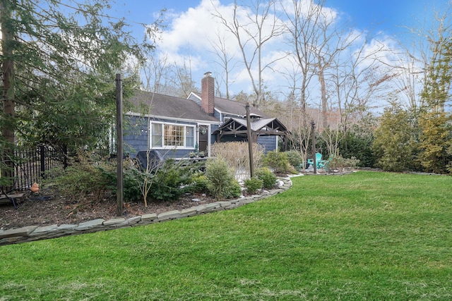 view of yard with fence