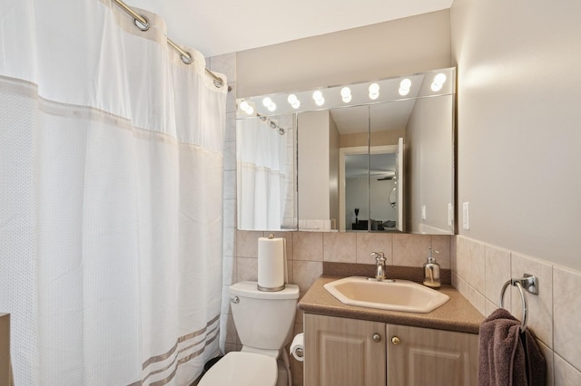 full bathroom featuring vanity, tile walls, toilet, and a shower with curtain