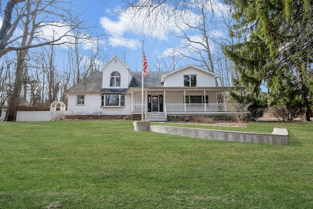 view of front of house featuring a porch and a front yard