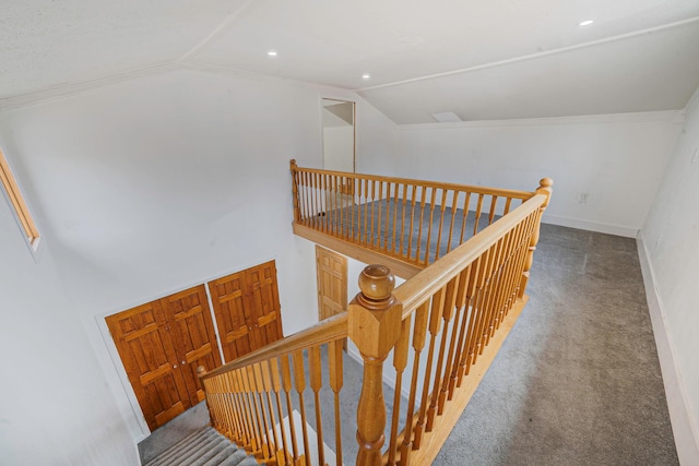 stairs featuring recessed lighting, baseboards, carpet flooring, and vaulted ceiling