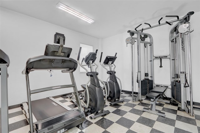 gym with tile patterned floors