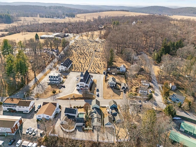 bird's eye view featuring a wooded view