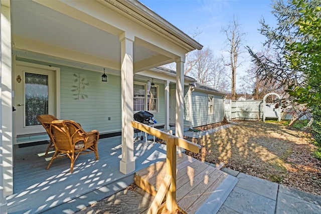 view of patio / terrace featuring fence